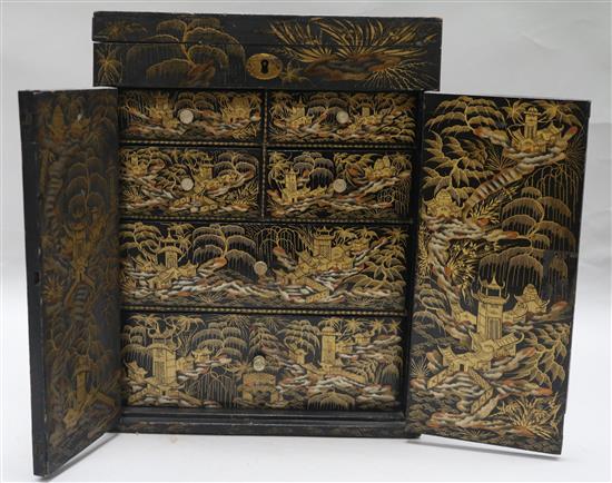 A Regency Japanned chinoiserie cabinet